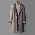 Dual-tone wool coat with notched lapels, button front, and ribbed turtleneck collar