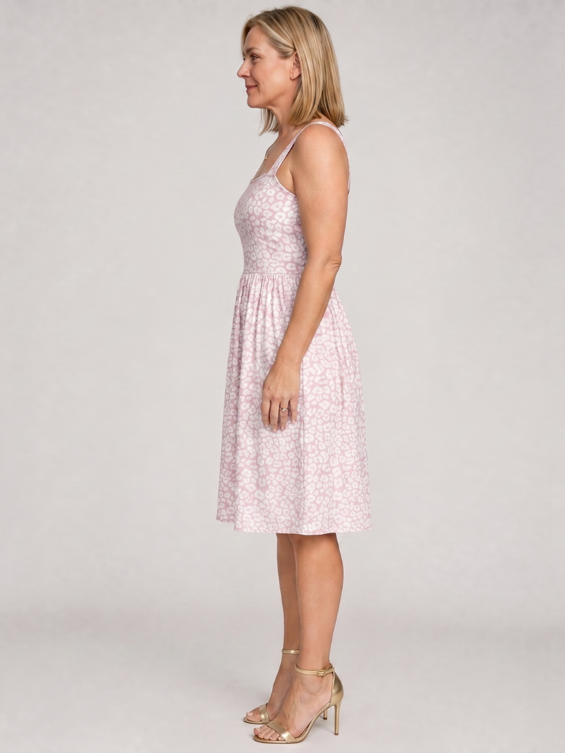 Pink floral square-neck knee-length sleeveless dress, side view