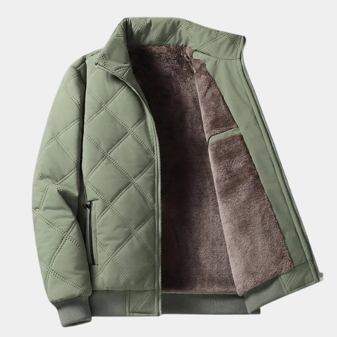 Green quilted jacket with front zipper and brown sherpa lining, ribbed cuffs
