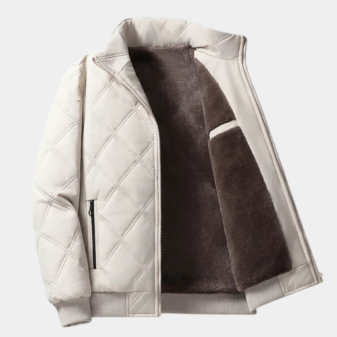 White quilted jacket with front zipper and brown sherpa lining, ribbed cuffs