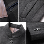 Gray winter jacket detail: button placket, faux pocket flap, and textured fabric