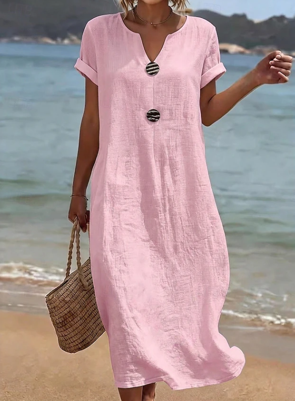 Pink button-front maxi dress with short sleeves and relaxed fit, round neckline