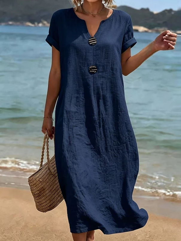 Navy button-front maxi dress with short sleeves and relaxed fit, round neckline