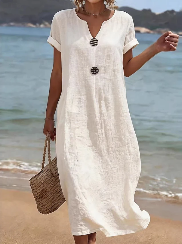 White button-front maxi dress with short sleeves and relaxed fit, round neckline