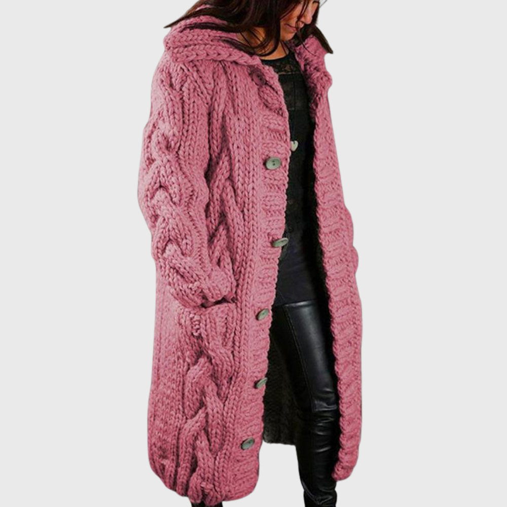 Pink cable-knit long coat with button front and raised textured pattern