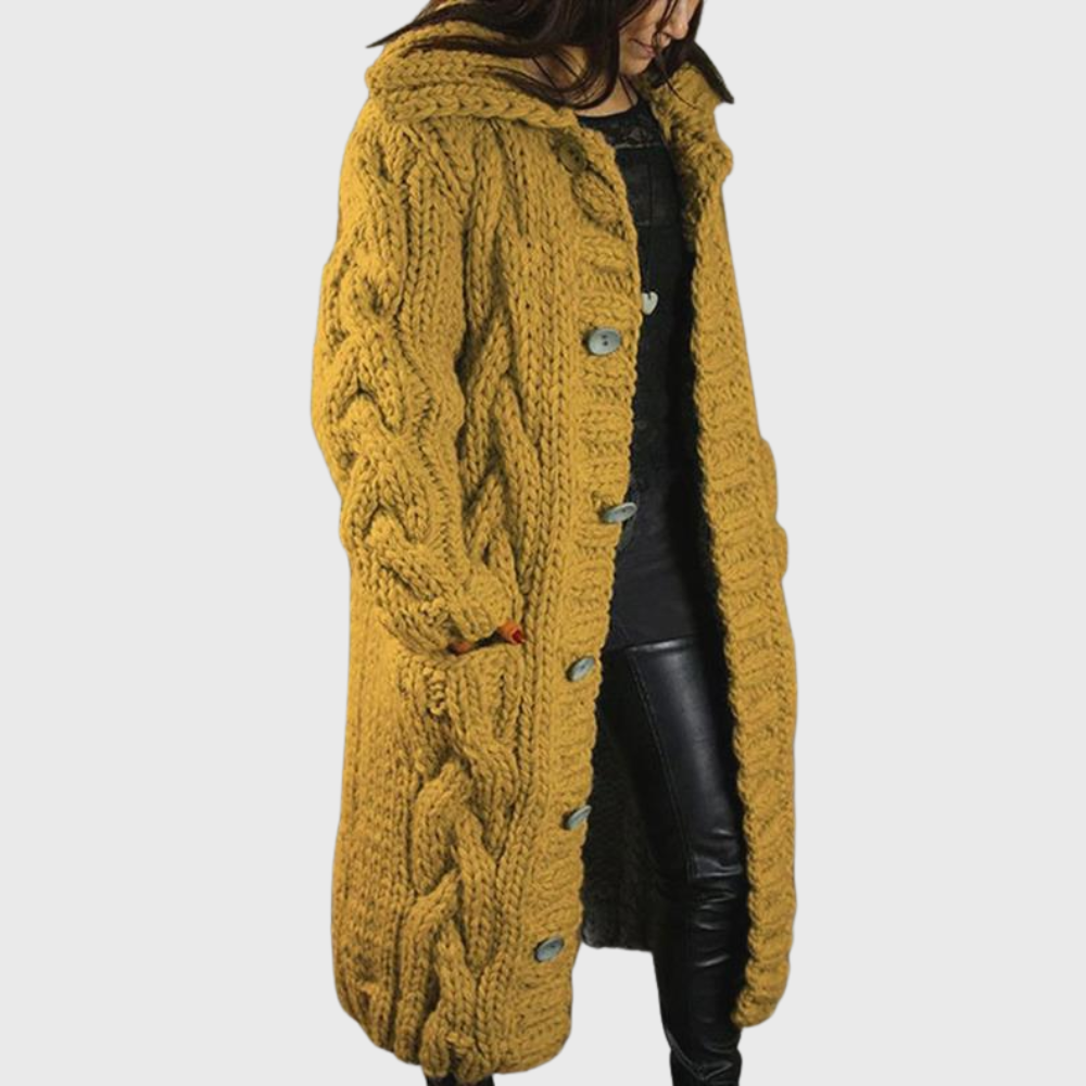 Yellow cable-knit long coat with button front and chunky cable texture