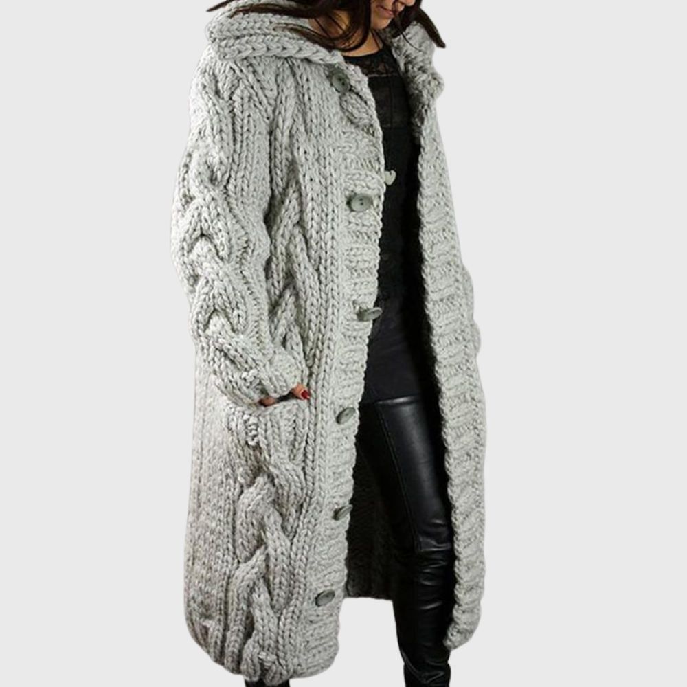Light grey cable-knit long coat with button front and chunky cable texture
