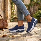 Women's navy knit walking trainers with cushioned footbed and flexible sole