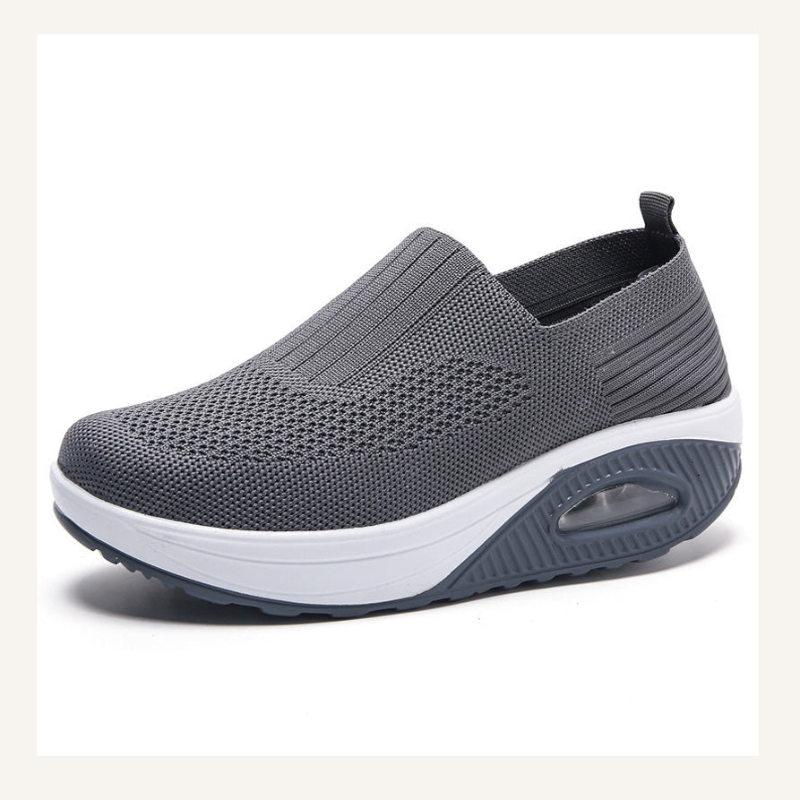 Grey lightweight breathable slip-on walking trainers with white sole and cushioned heel