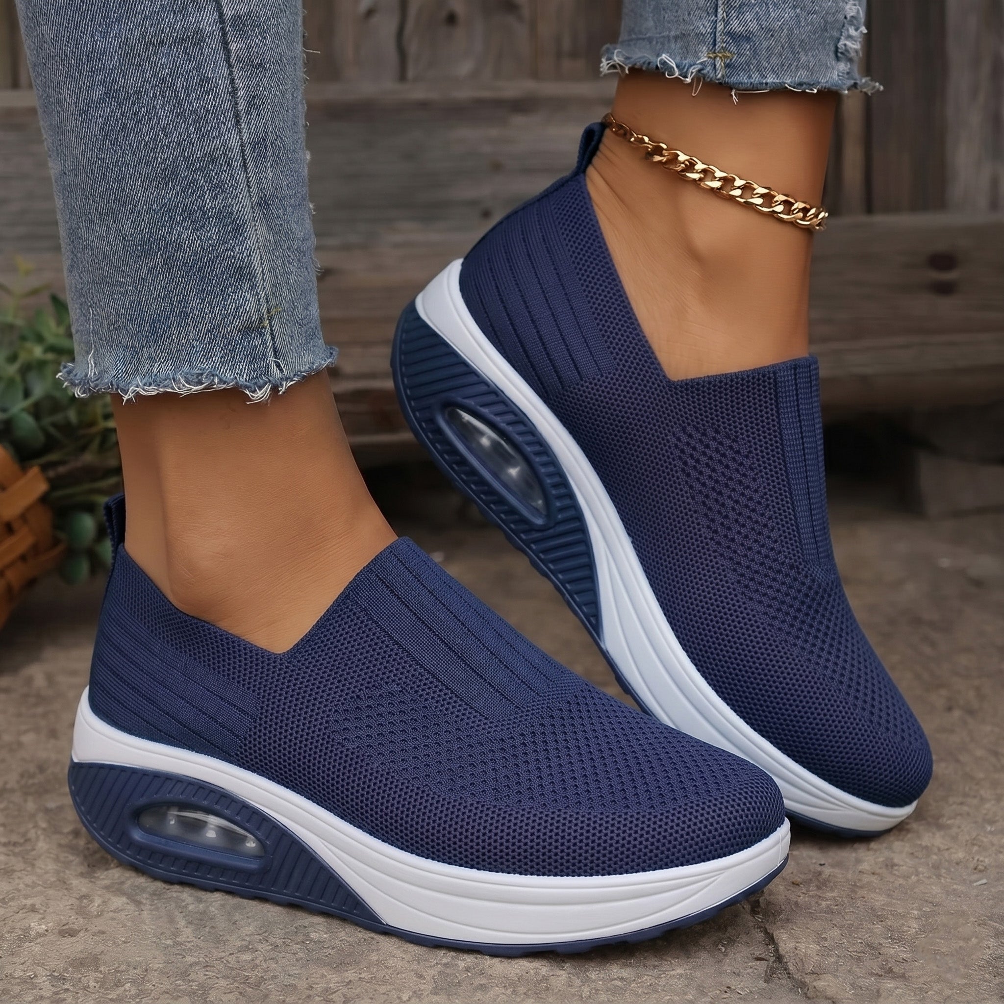 Blue lightweight breathable walking trainers with slip-on knit and white platform sole