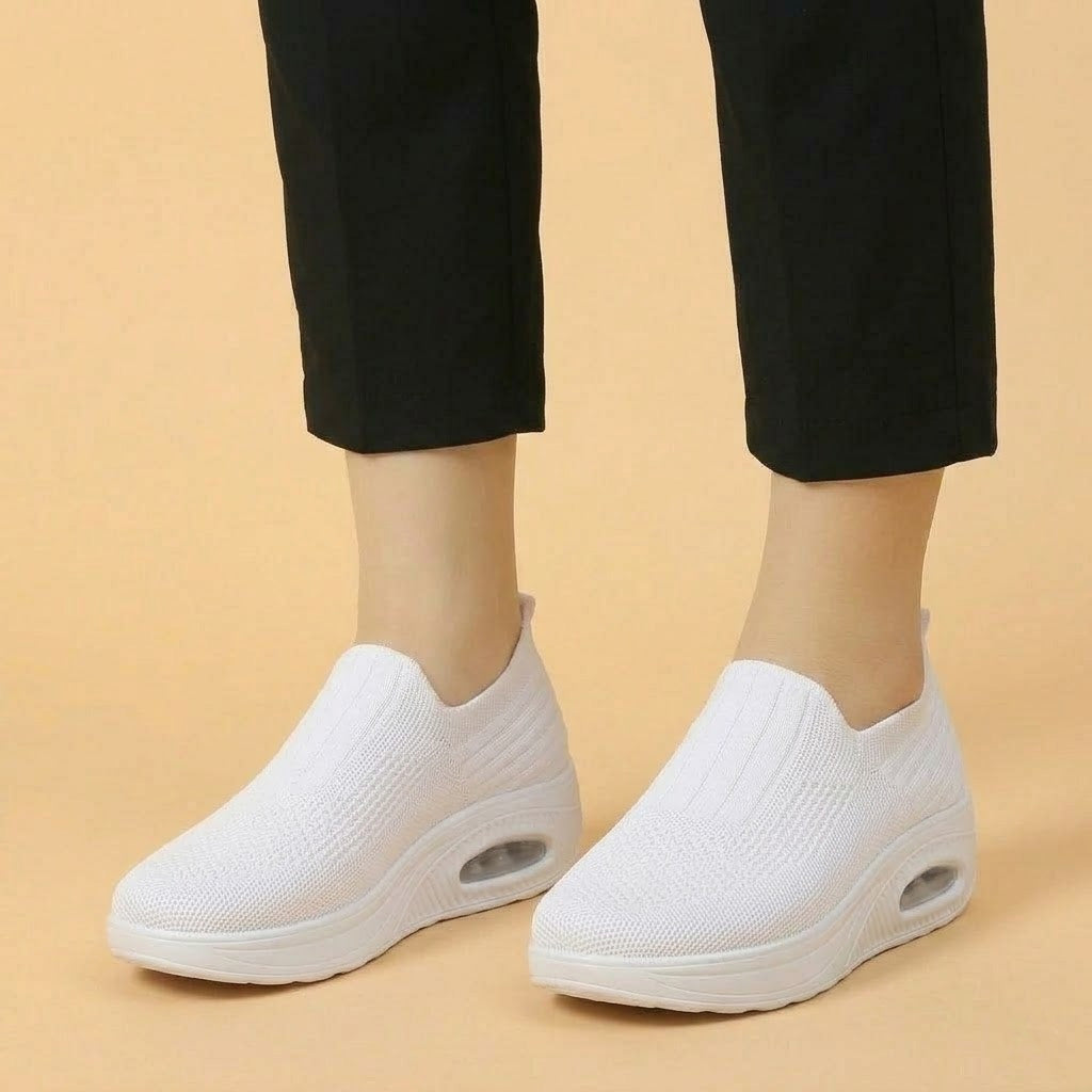 White lightweight breathable walking trainers with slip-on knit and air-cushion heel