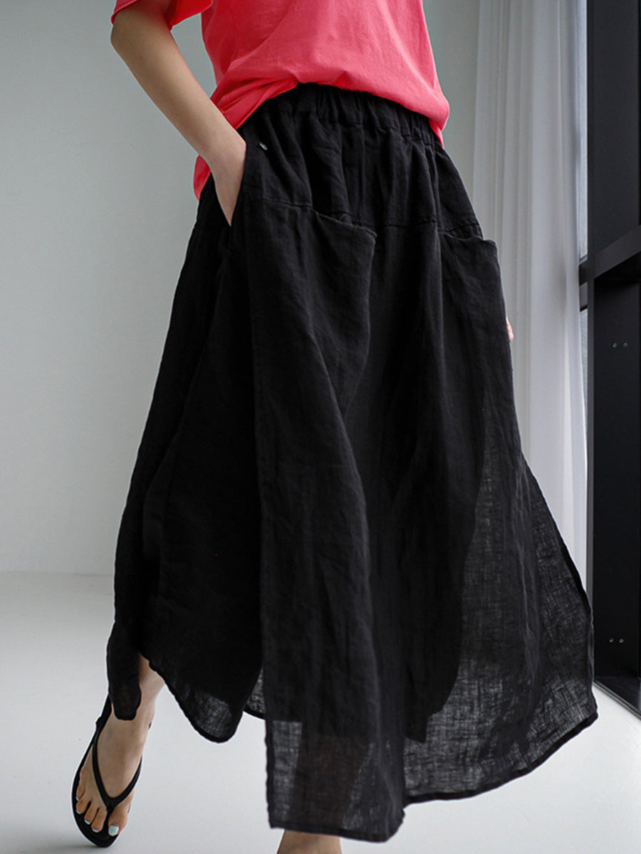 Black linen culottes with wide legs, elastic waist, and side pockets
