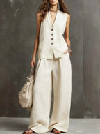 White V-neck waistcoat and wide-leg trousers set with gold button front