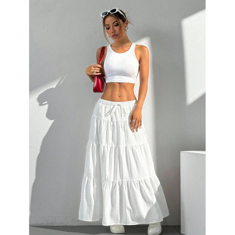 White long tiered A-line skirt with drawstring waist and ruffled tiered hem