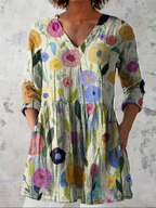 Women’s V-neck longline blouse with multicolored floral print, relaxed fit, 3/4 sleeves