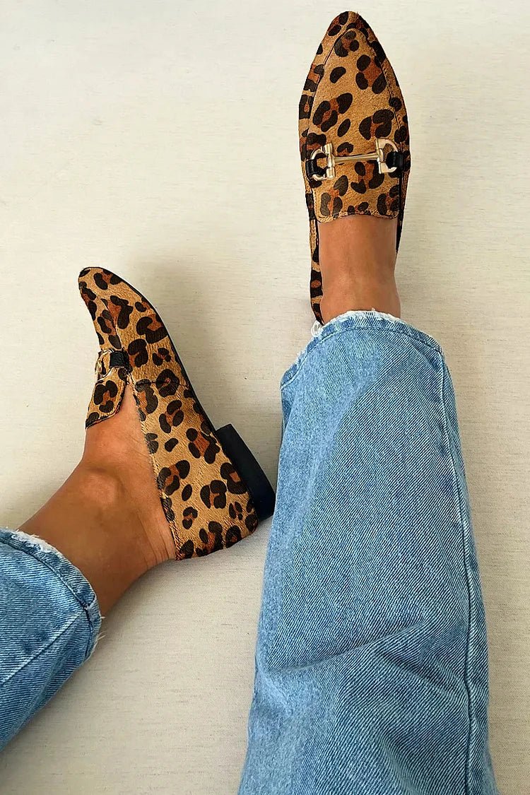 Leopard-print slip-on loafers with metallic buckle and dark sole