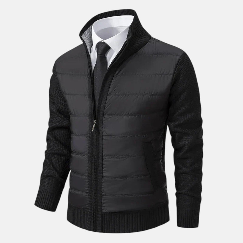 Black quilted puffer jacket with zip front, knit sleeves, and ribbed hem
