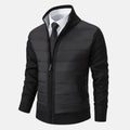 Black quilted puffer jacket with zip front, knit sleeves, and ribbed hem