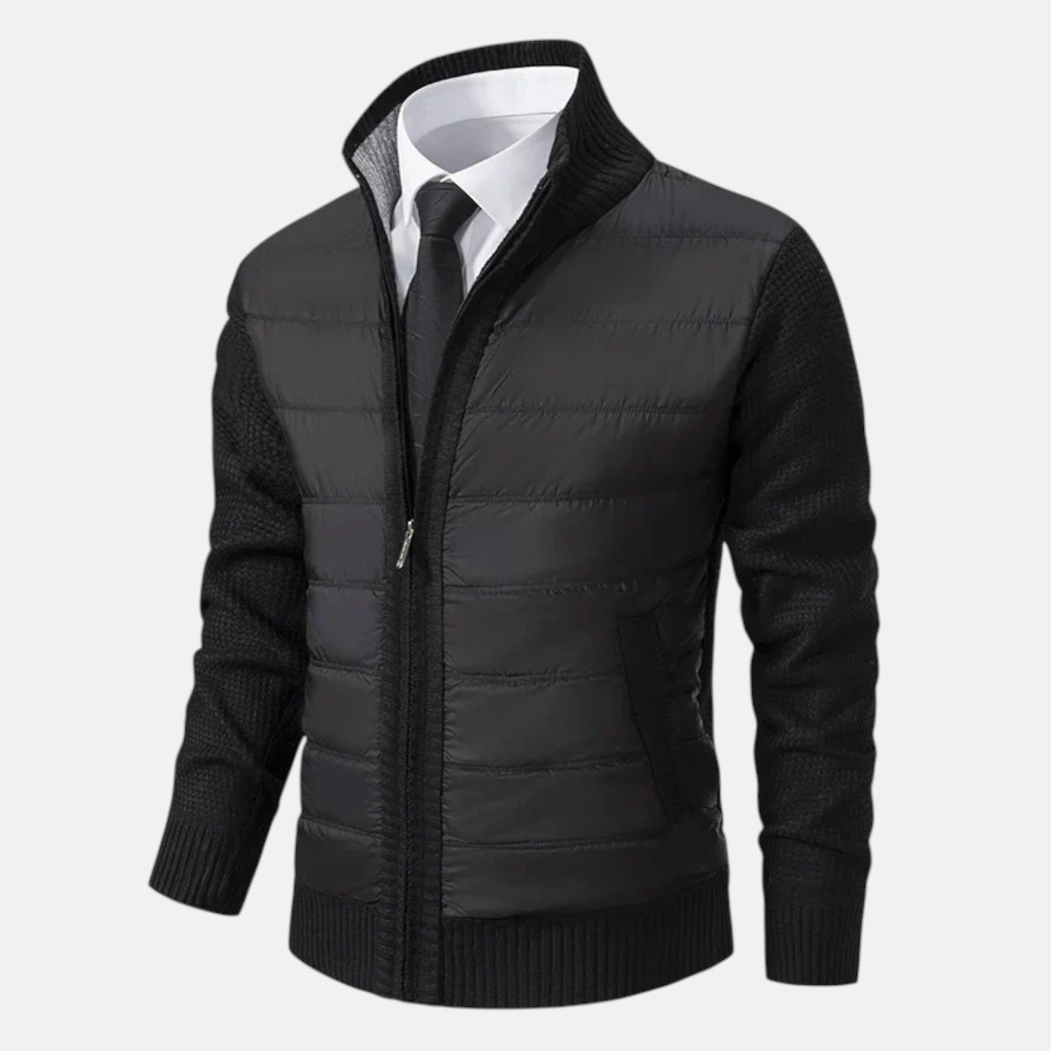 Black quilted puffer jacket with zip front, knit sleeves, and ribbed hem