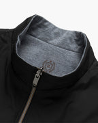 Insulated bodywarmer vest with gray inner lining, front zip and hood-style stand collar