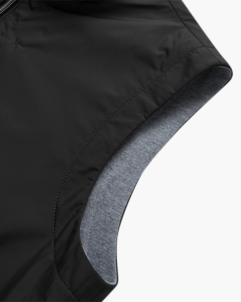 Insulated bodywarmer vest, black outer with gray seam detail and curved hem lining
