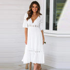White bohemian midi dress with deep V-neck and lace trim, short sleeves