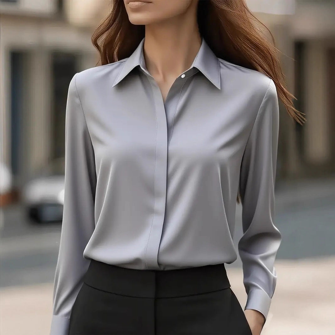 Light gray button-front blouse with point collar and long sleeves