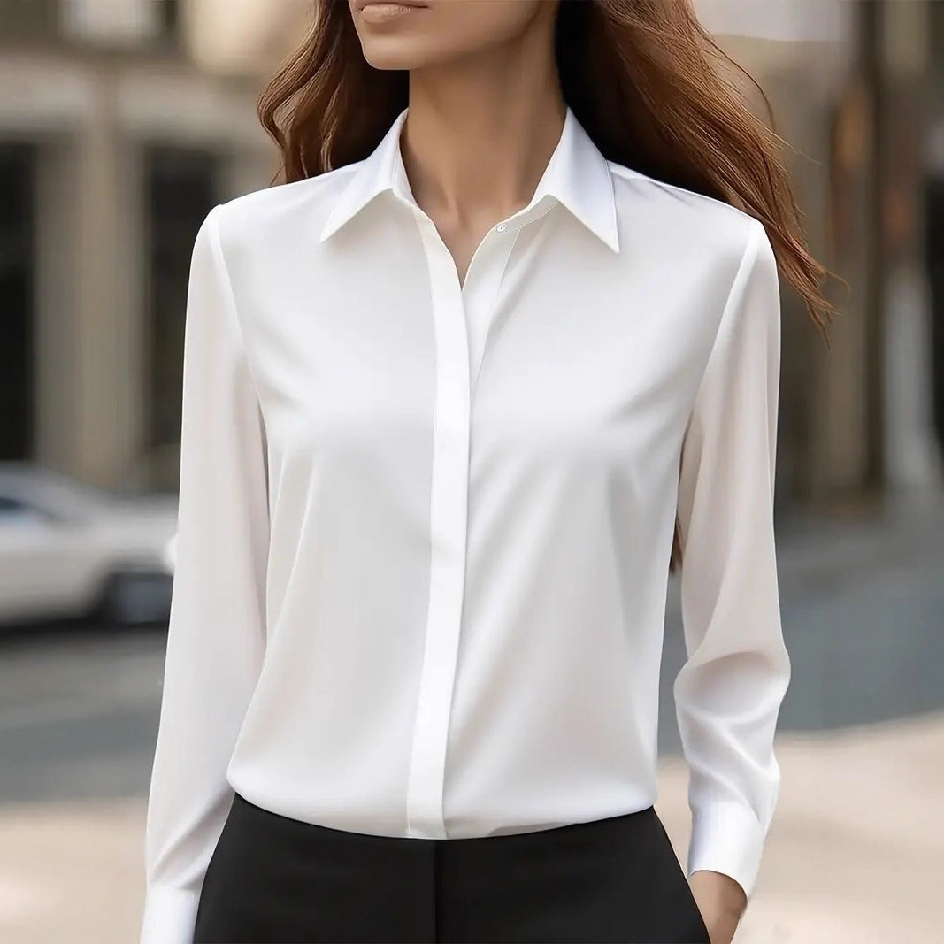White button-front blouse with point collar and long sleeves
