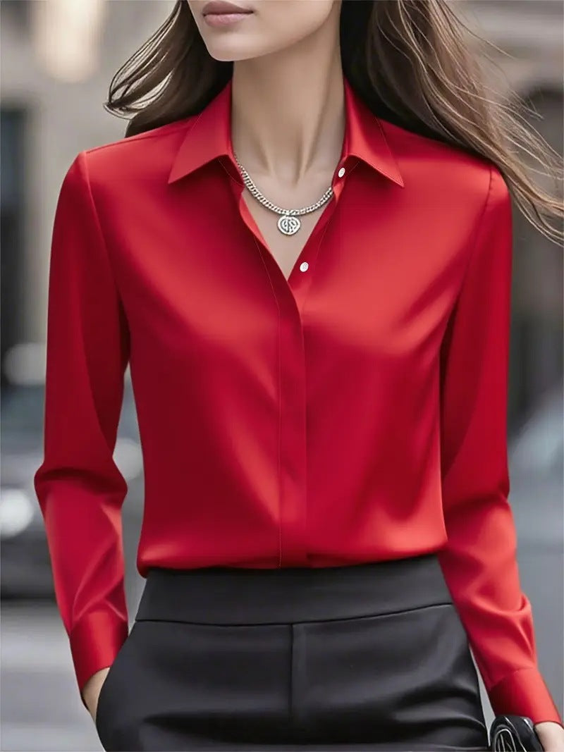 Red button-front blouse with point collar and long sleeves