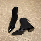 Black suede ankle boots with glossy pointed toe and block heel, side zipper