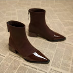 Brown suede ankle boots with glossy pointed toe and block heel, side zip