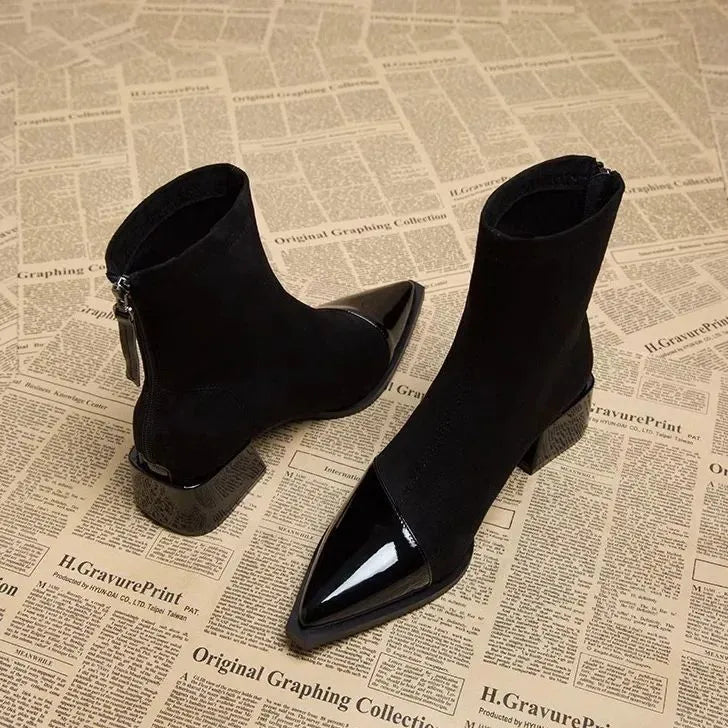 Black suede ankle boots with glossy pointed toe, side zipper and block heel
