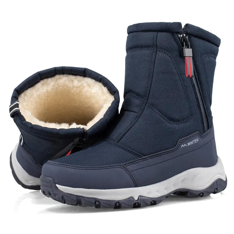 Mid-calf snow boots in dark navy with beige faux-fur lining and side zipper