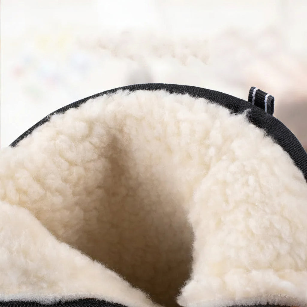 Faux-fur boot lining, cream and white, in a mid-calf snow boot cuff