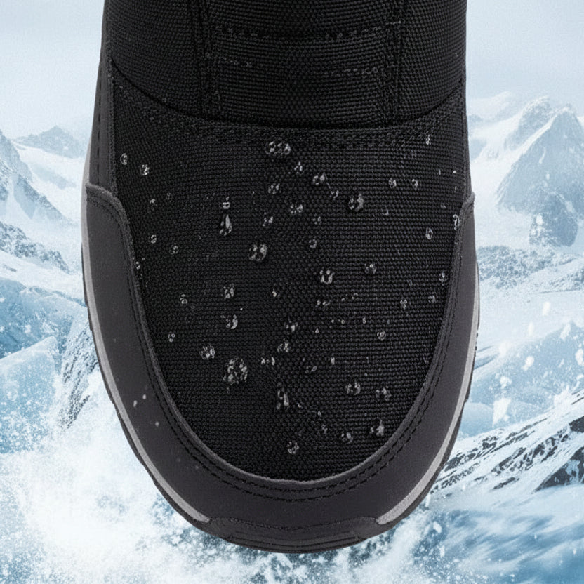 Black mid-calf snow boots with textured upper and water beading on the fabric