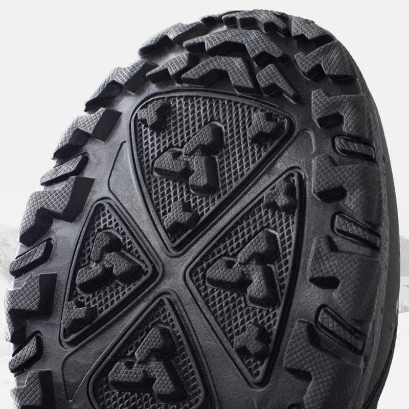 Rubber lug outsole for mid-calf snow boots with deep traction tread