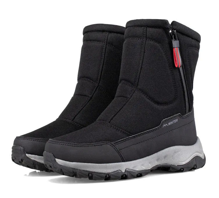 Mid-calf snow boots in black with side zipper, elasticized panels, and white midsole