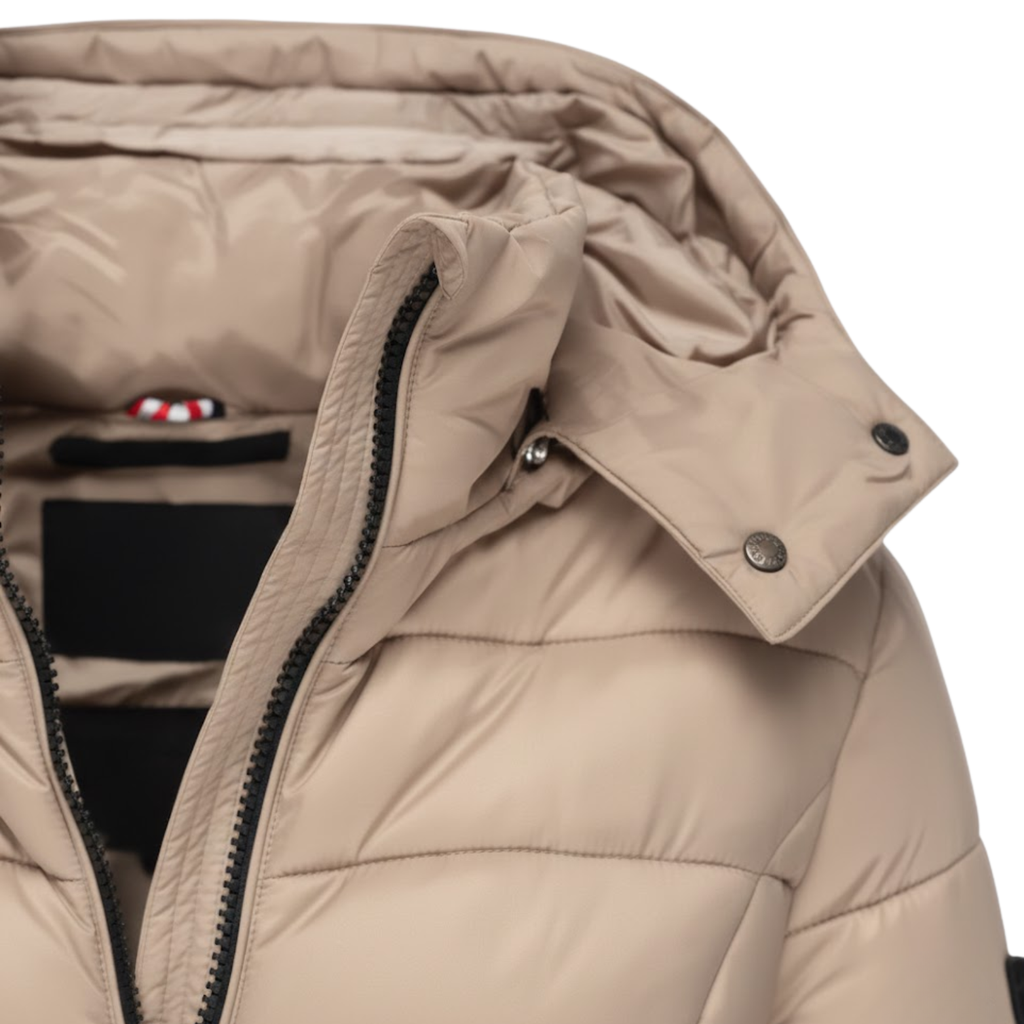 Beige hooded parka close-up with zip placket, flap buttons, and quilted stitching