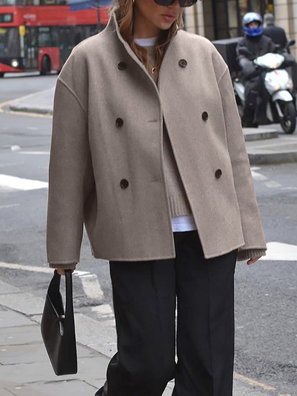 Taupe women's double-breasted pea coat featuring dark buttons and roomy mid-length cut