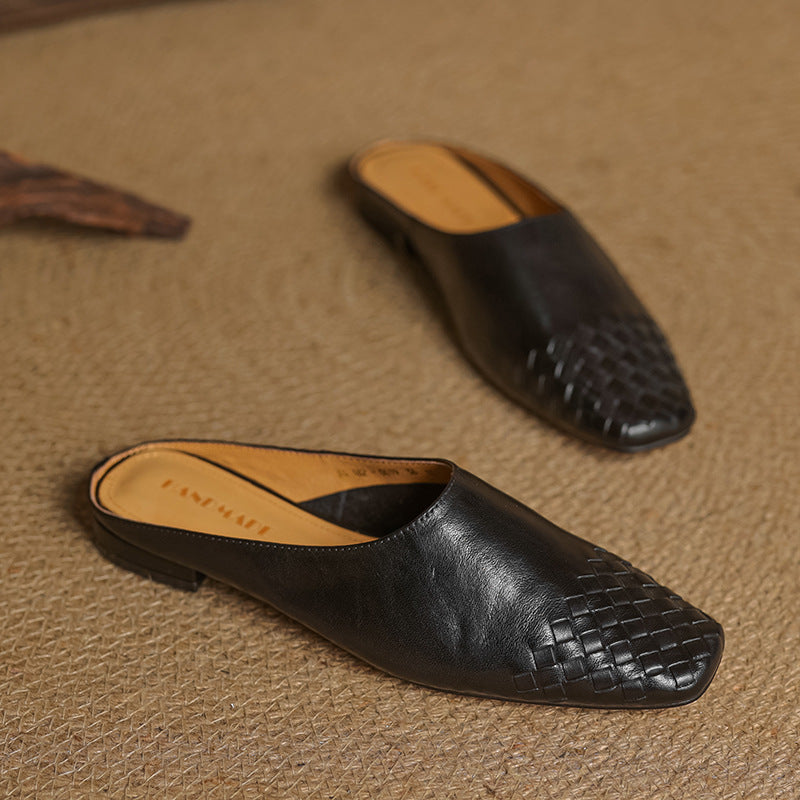 Women’s black leather mule, slip-on woven toe pattern with low heel