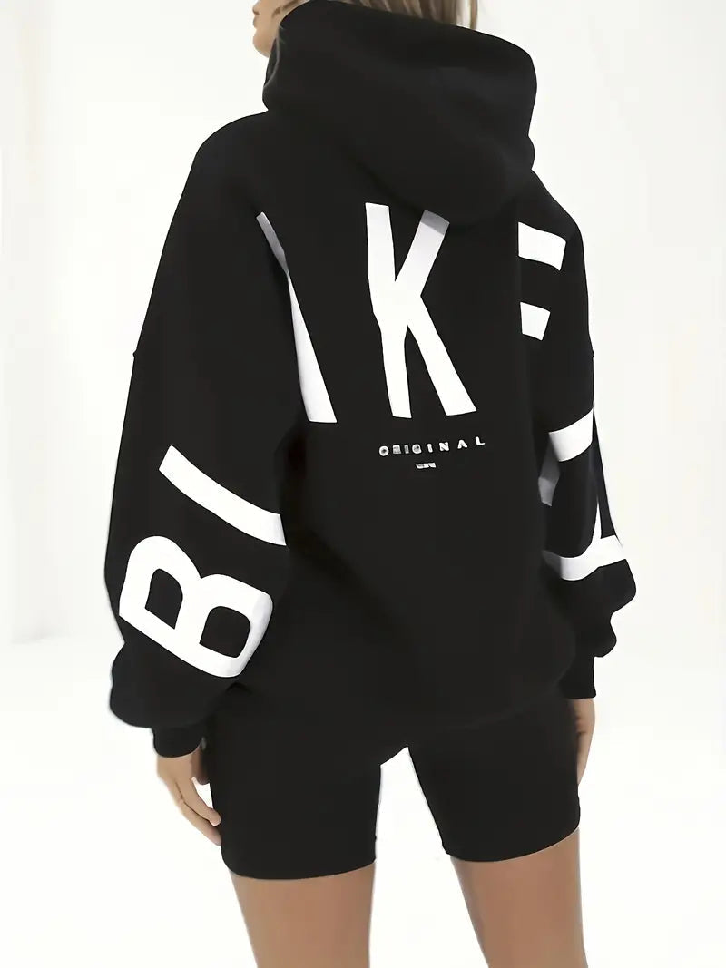 Women’s black hooded jacket with hooded back and bold white graphic lettering