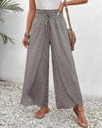 Women’s smocked waist palazzo trousers, dark gray patterned wide-leg pants