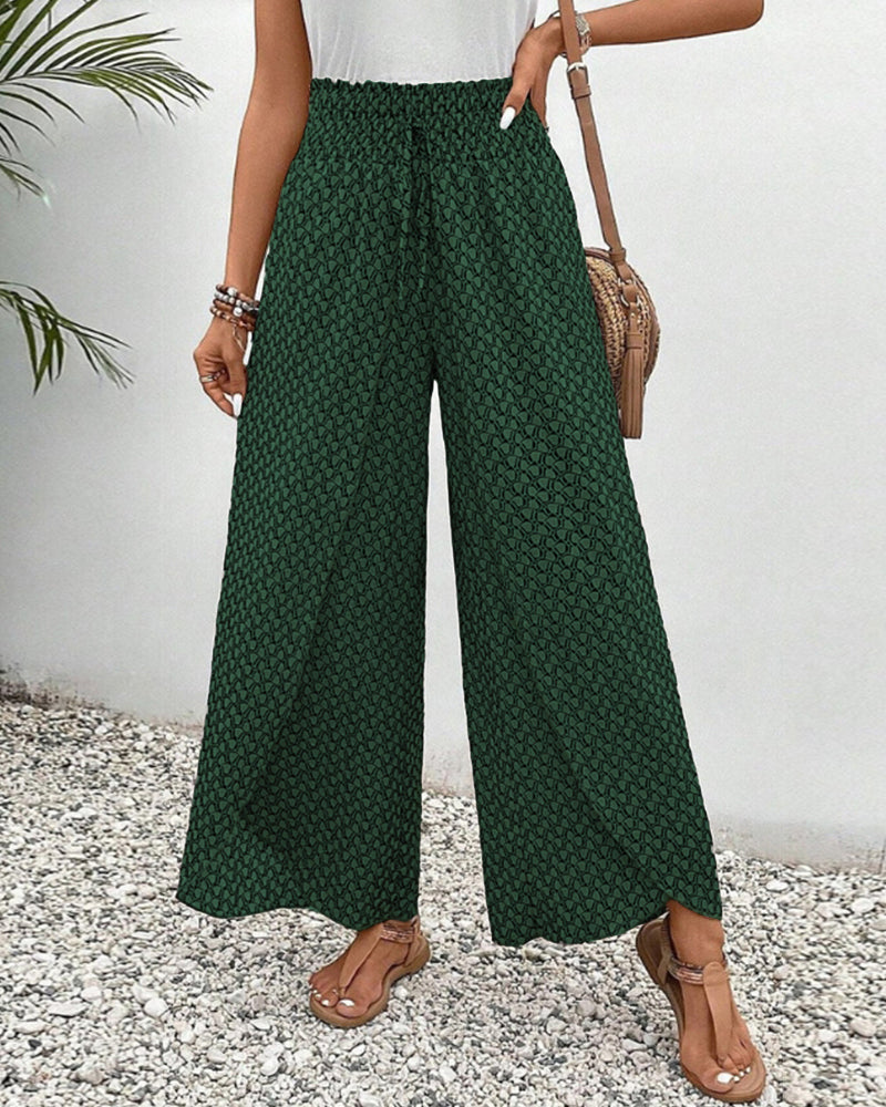Women's smocked-waist palazzo trousers in dark green with subtle pattern