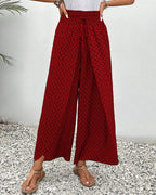 Women’s smocked waist palazzo trousers, bold red allover print with wide flared legs
