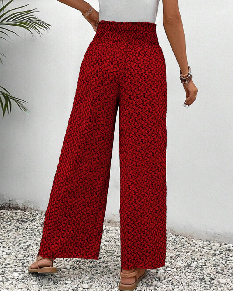Women’s smocked waist palazzo trousers, red patterned wide-leg pants