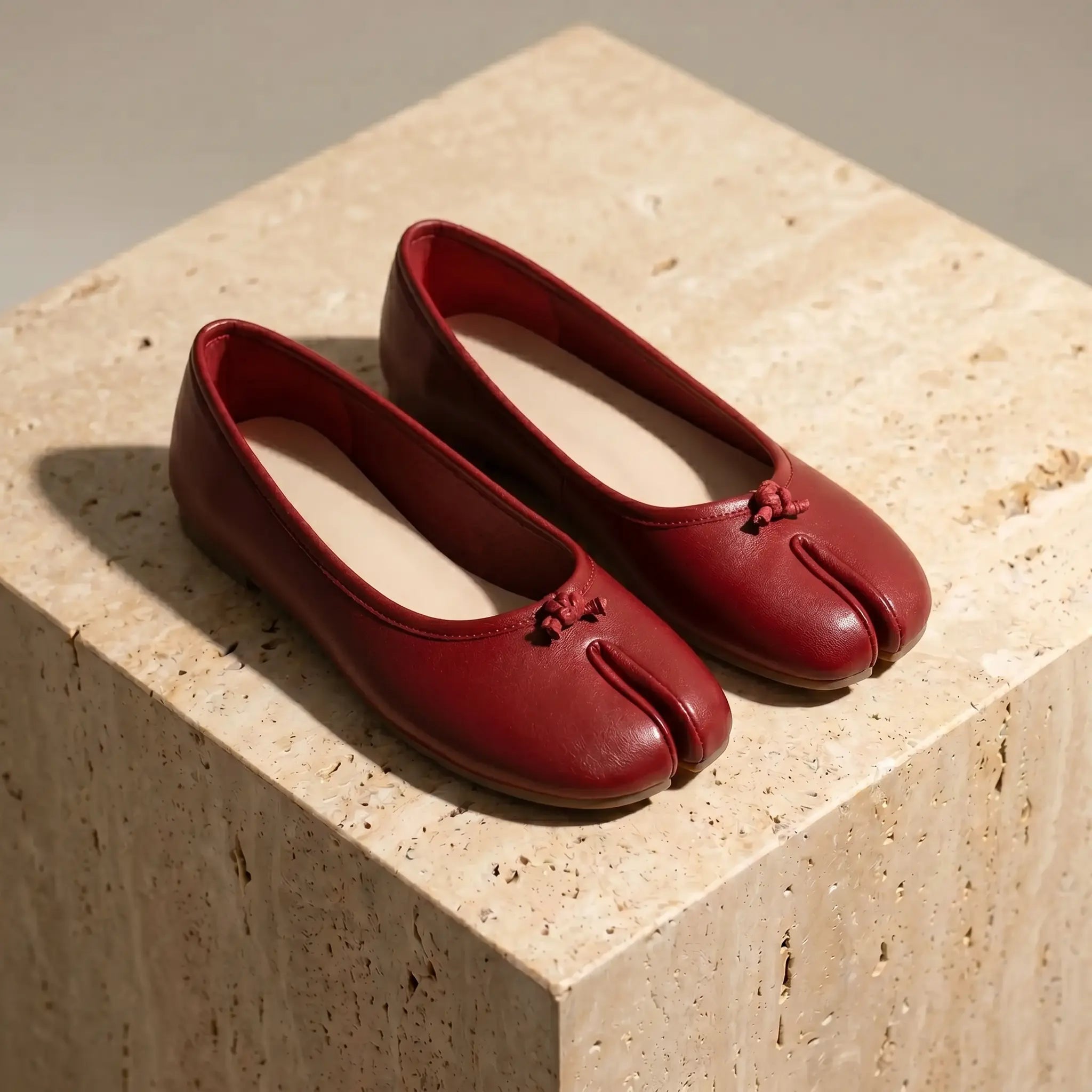Women's split-toe ballet flats in crimson red with micro-bow detail, slip-on flat heel