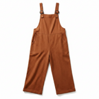 Terracotta red wide-leg overalls with adjustable buckle straps and front bib pocket