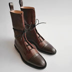 Women’s brown lace-up calf boots with metal eyelets and textured lug sole