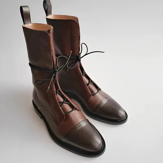 Women’s brown lace-up calf boots with metal eyelets and textured lug sole