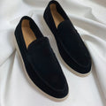 Women’s suede leather loafers, black slip-on with stitched moc toe.